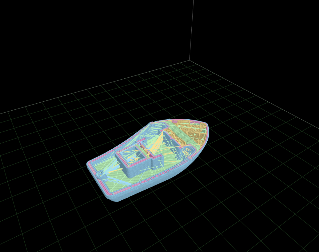 3DBenchy clipped to layer 73 of 174, exposing perimeters and infill with feature coloring